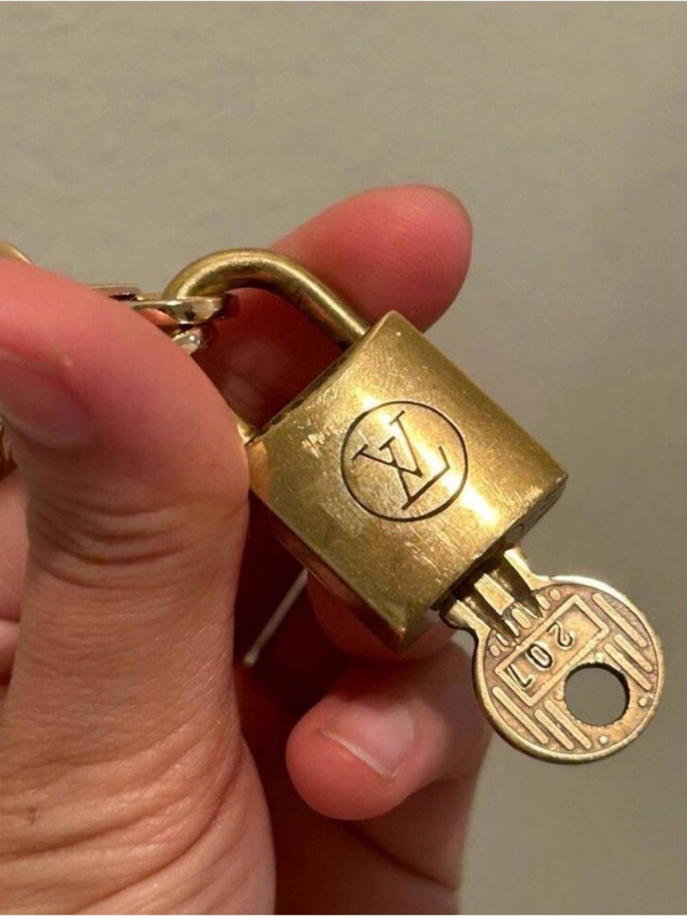 Louis Vuitton #207 Lock and Key
W/ Gold Chain
